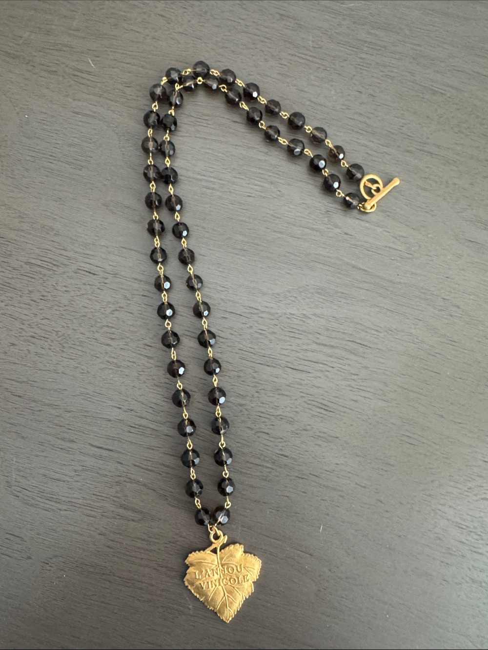 Brown Beaded Necklace with Gold Leaf Pendant